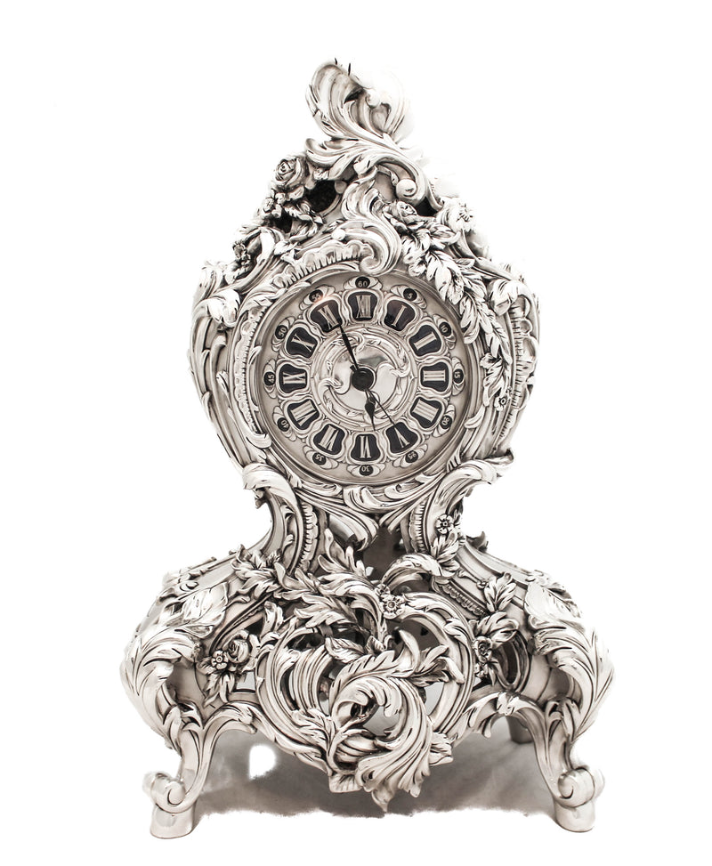 ITALIAN SILVER PLATED INTRICATE FLORAL CHASED TABLE CLOCK WITH PENDULUM